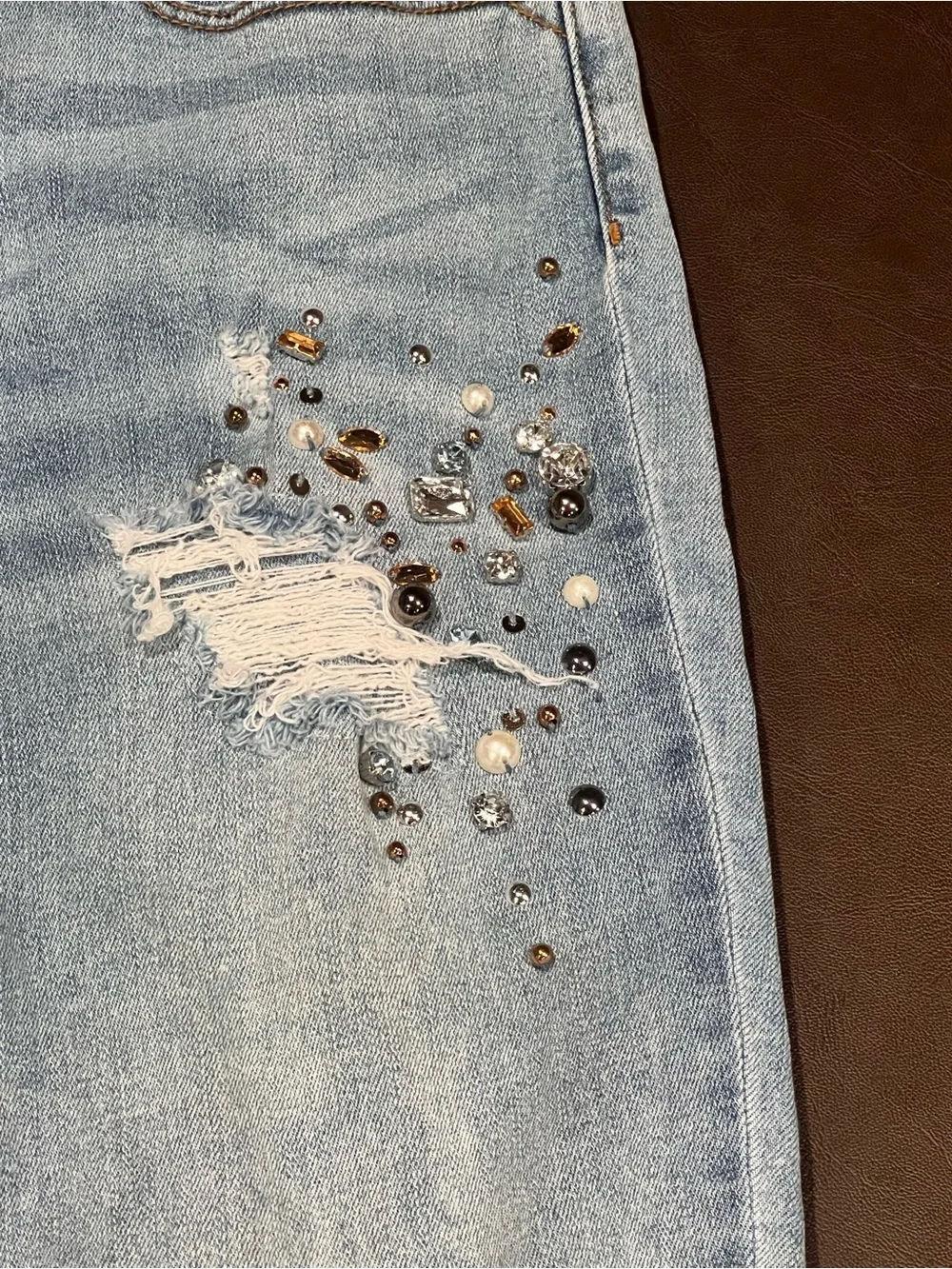 Chicos Light wash distressed jeans with rhinestones and studs size 1R